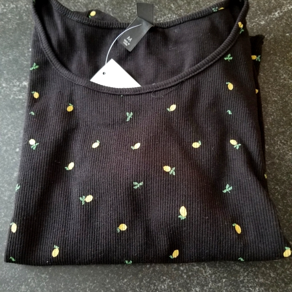 NWT  from Francesca's, ALYA ruffle edge ss shirt